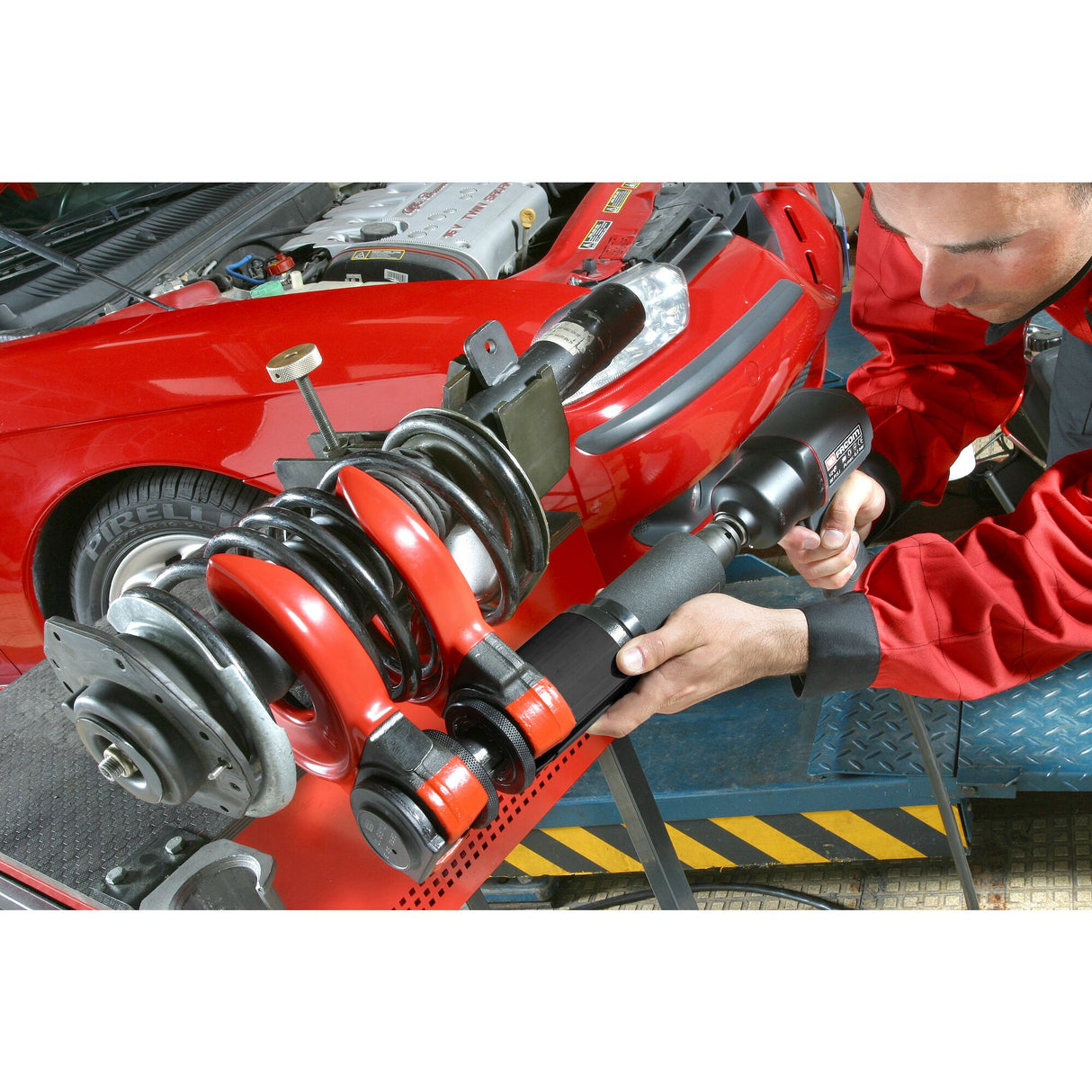 Compresseur de ressort, système universel à coupelles interchangeables