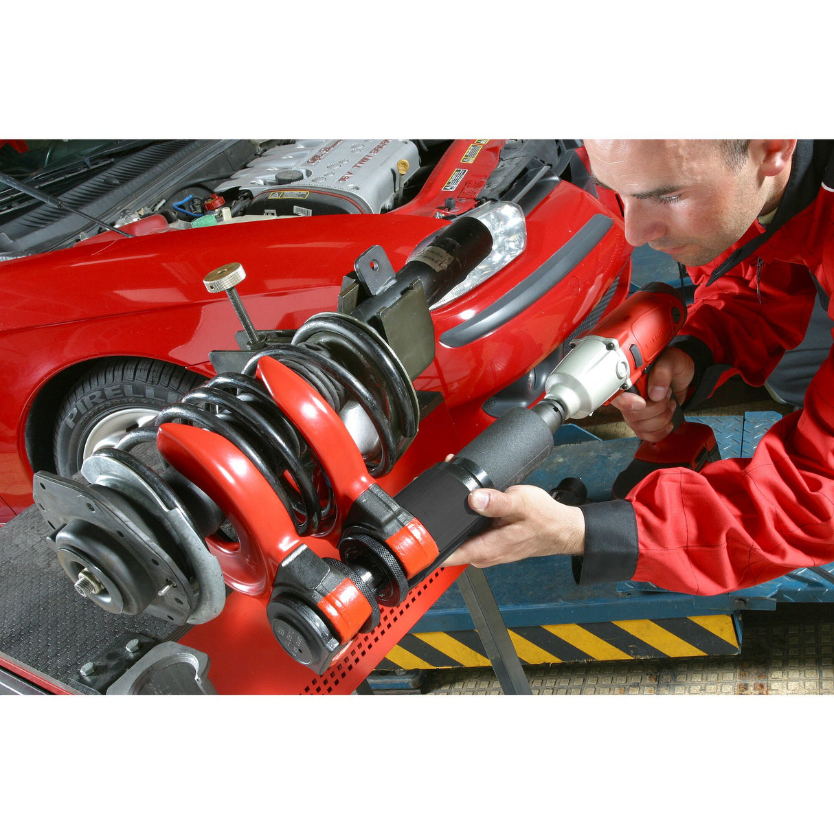 Compresseur de ressort, système universel à coupelles interchangeables